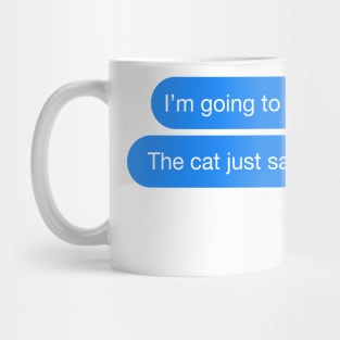 I'm going to be late... The cat just sat on me text message Mug